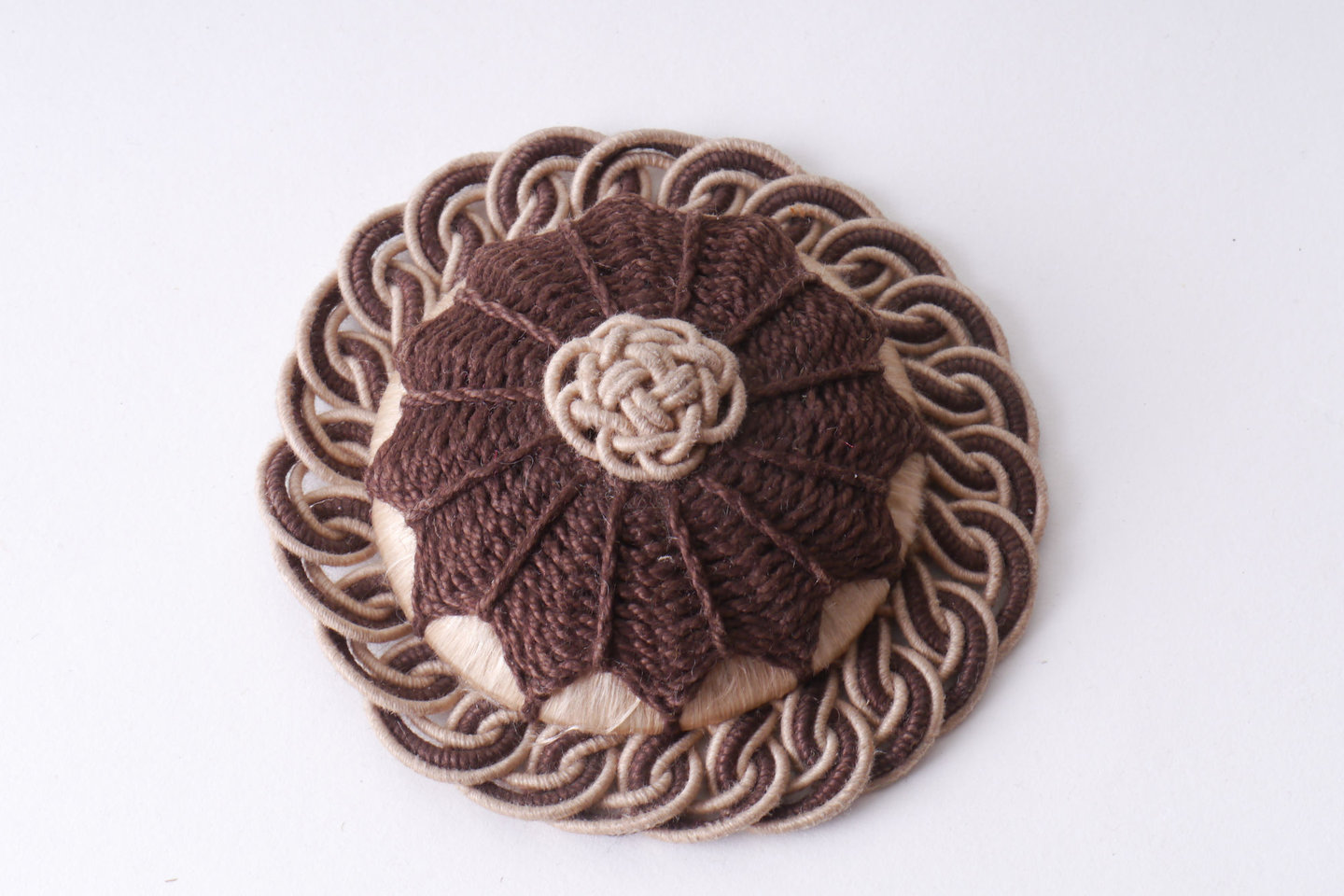 Macaron of rozet als onderdeel voor het vervaardigen van passement