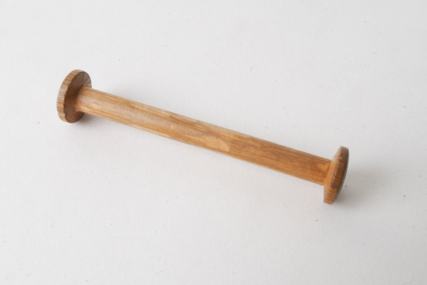 Spoel uit de passement om inslaggaren op te winden