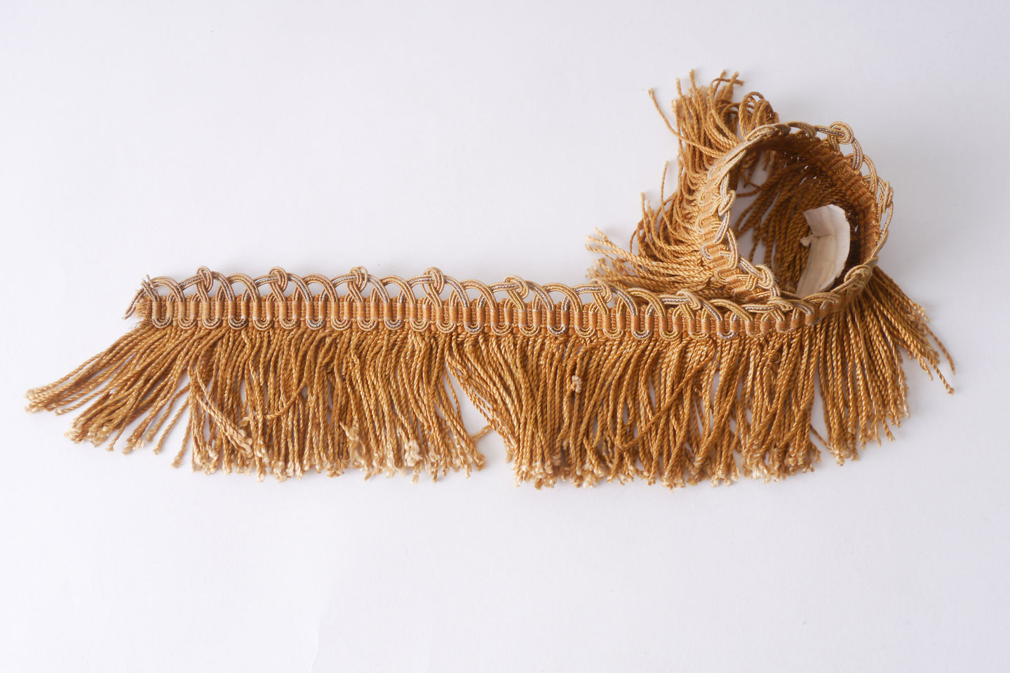 Effilé als onderdeel voor het vervaardigen van passement