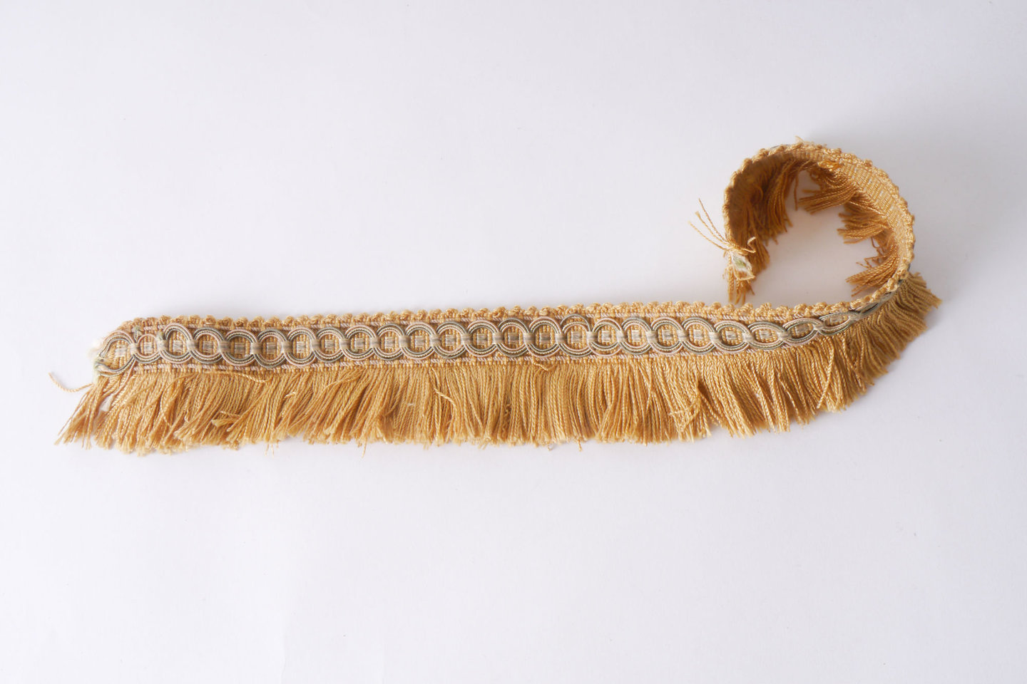 Effilé als onderdeel voor het vervaardigen van passement