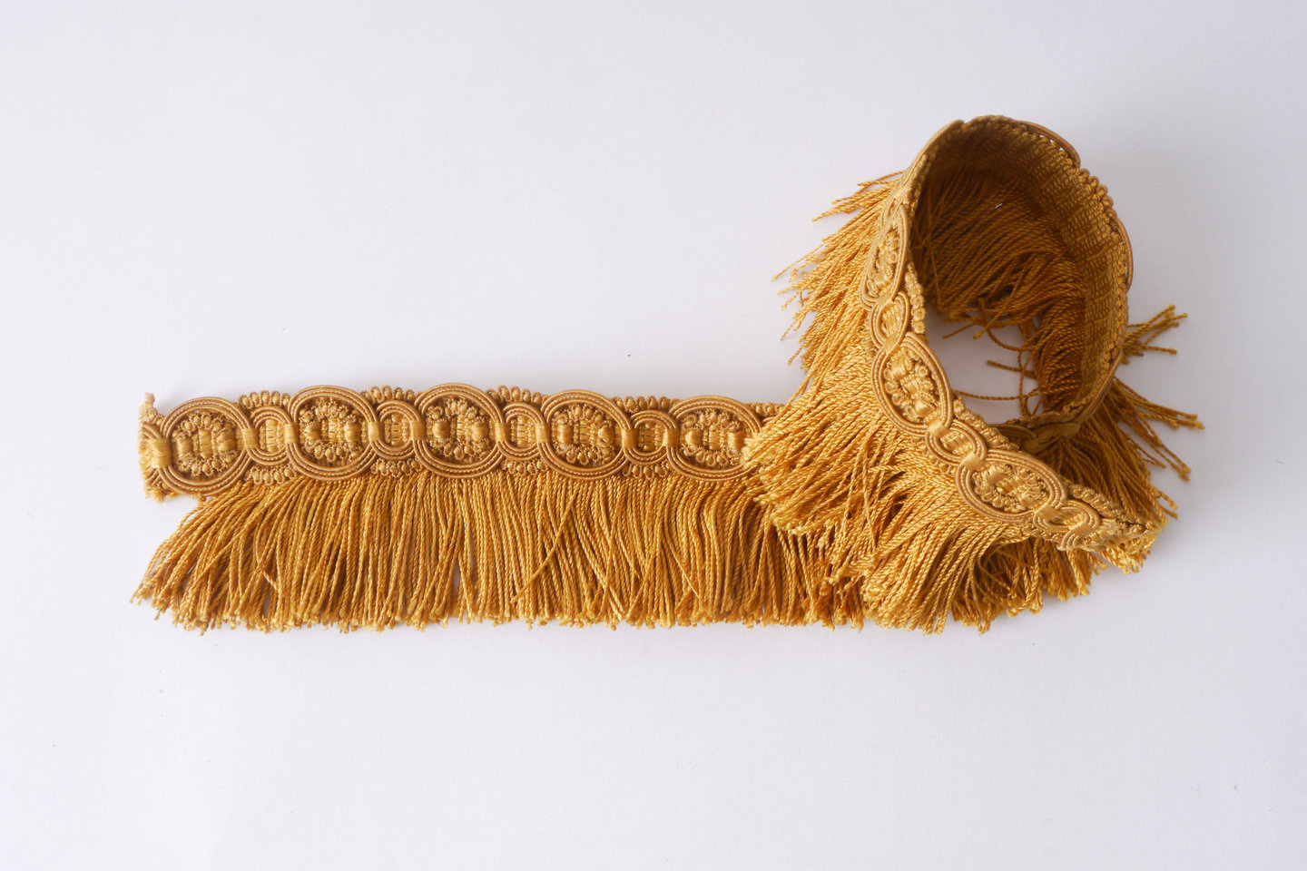 Effilé als onderdeel voor het vervaardigen van passement