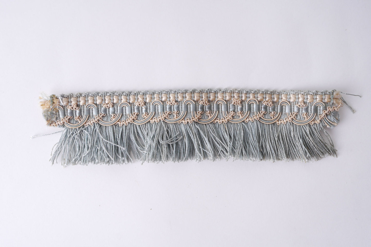 Effilé als onderdeel voor het vervaardigen van passement