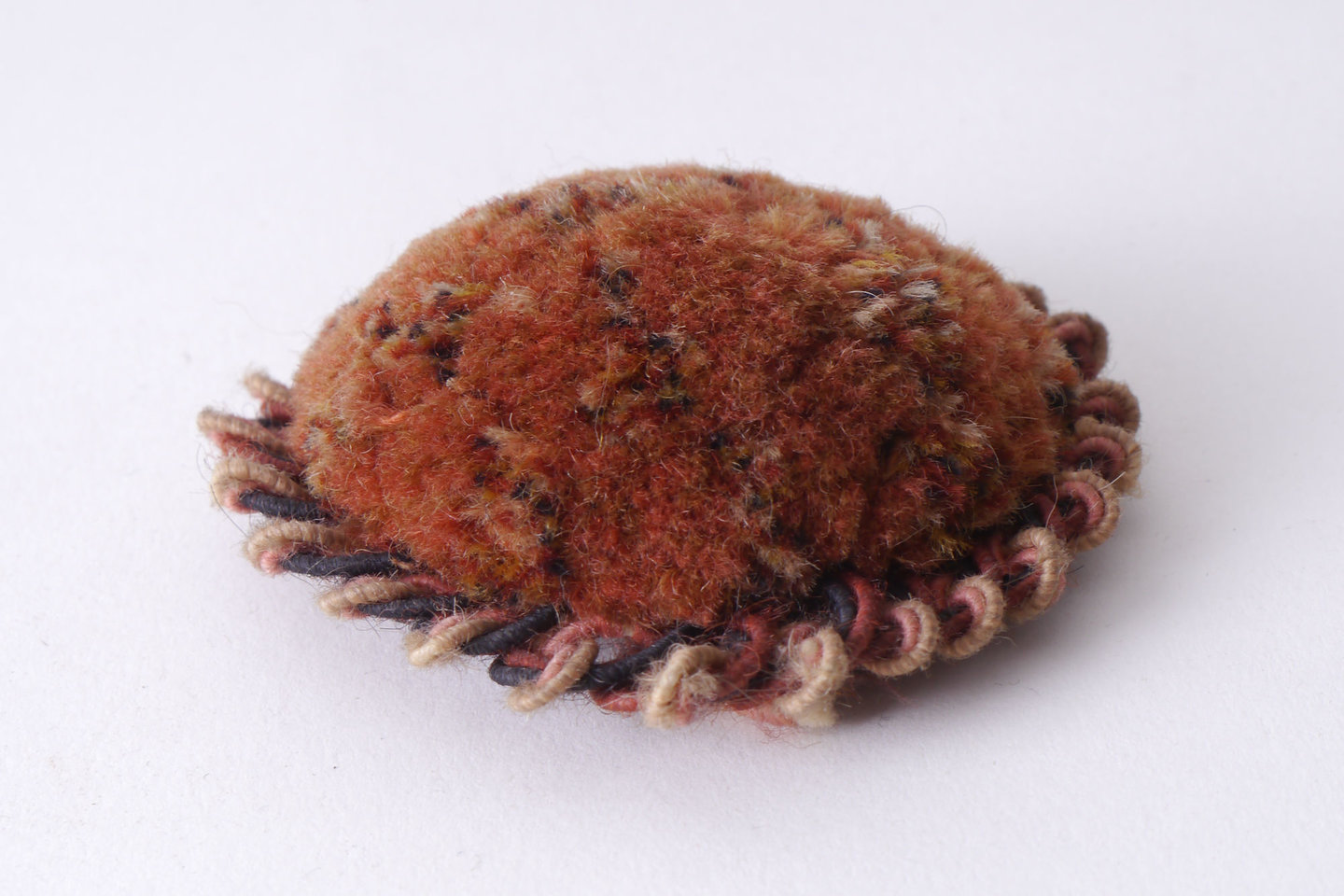 Macaron of rozet als onderdeel voor het vervaardigen van passement