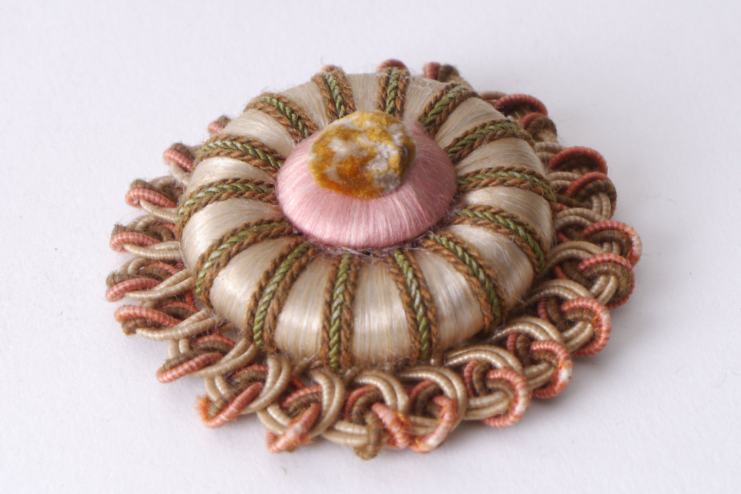 Macaron of rozet als onderdeel voor het vervaardigen van passement