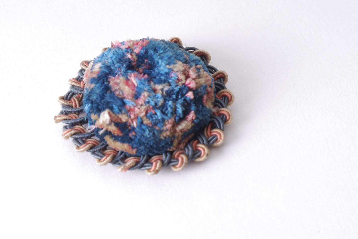 Macaron of rozet als onderdeel voor het vervaardigen van passement