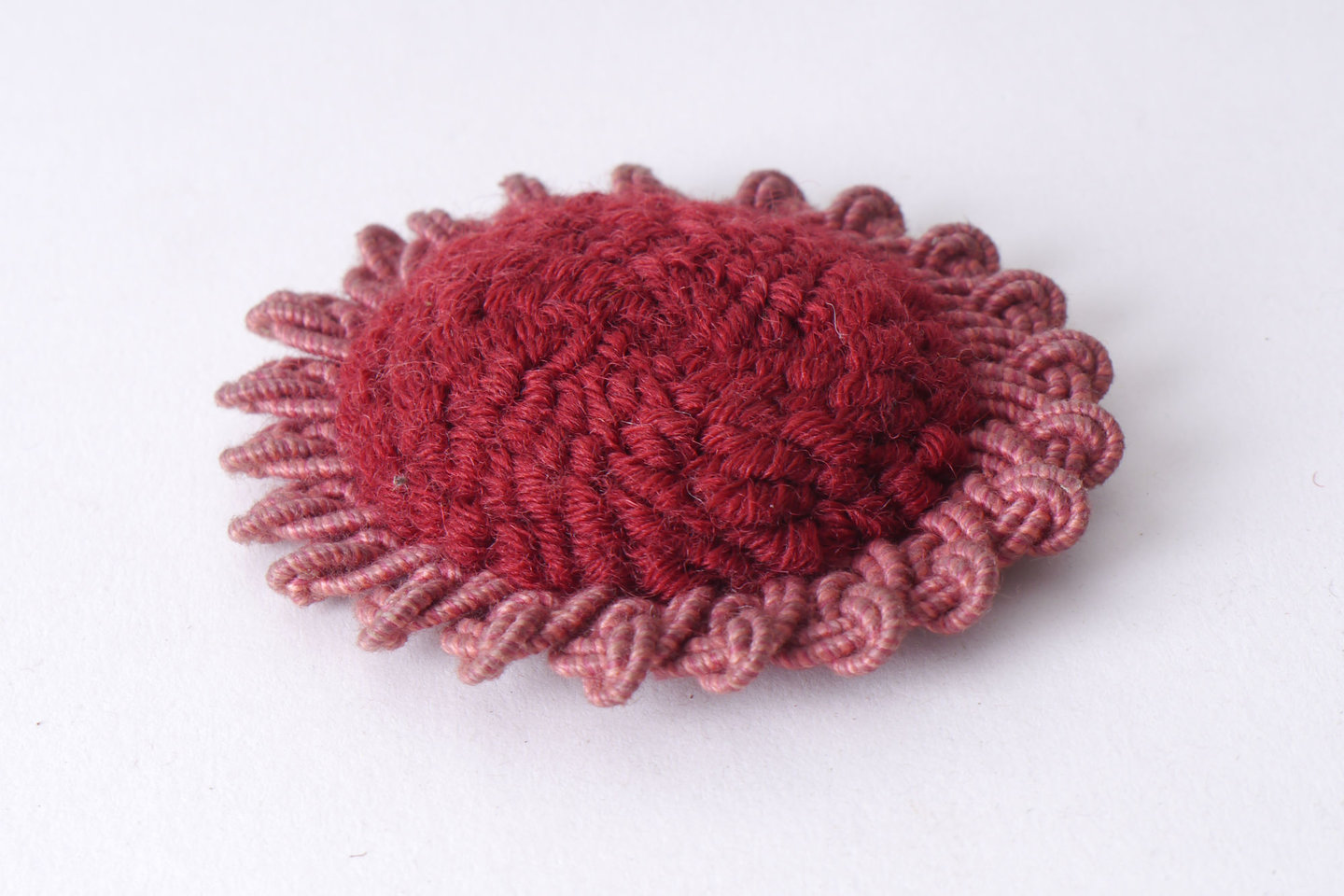 Macaron of rozet als onderdeel voor het vervaardigen van passement