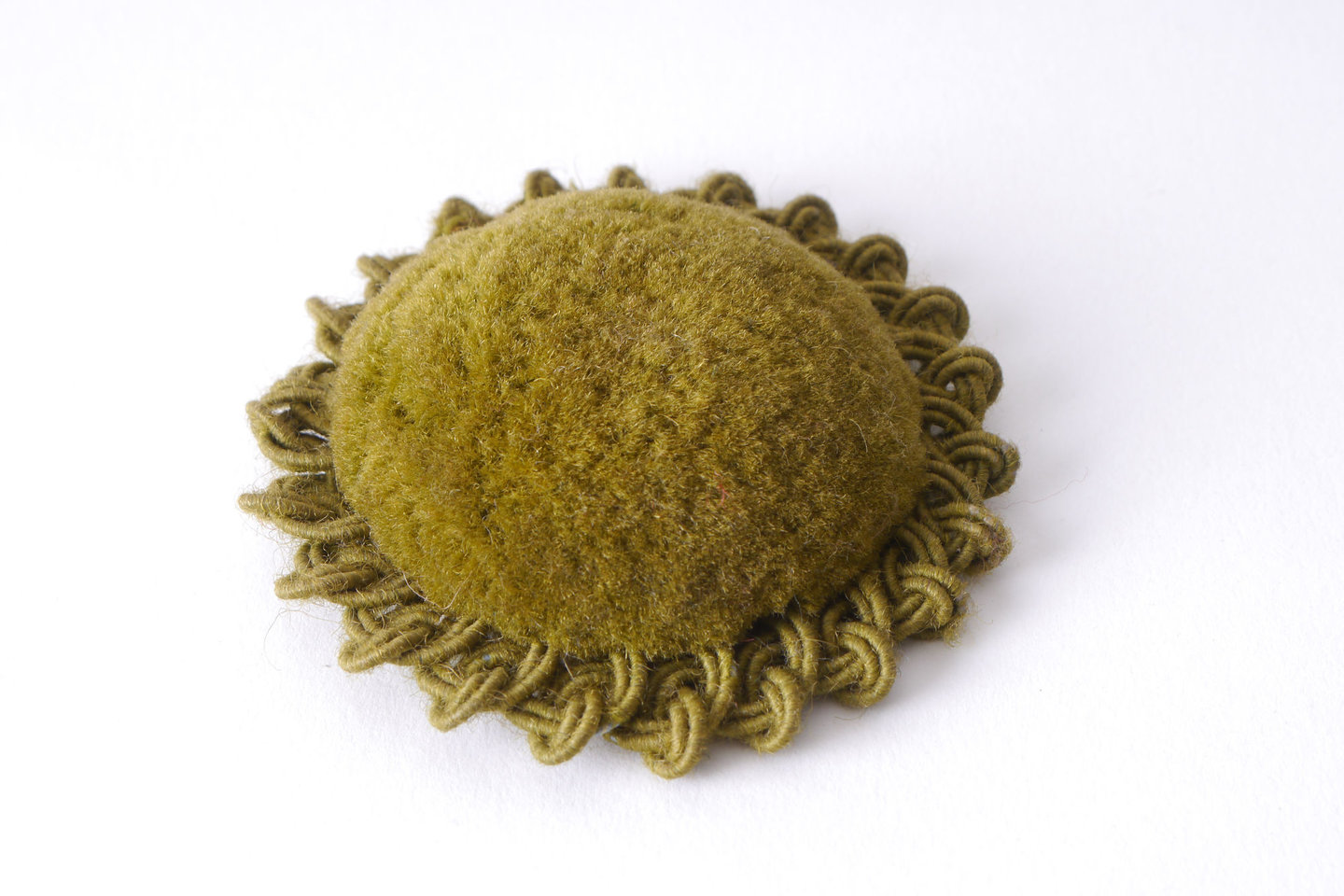 Macaron of rozet als onderdeel voor het vervaardigen van passement