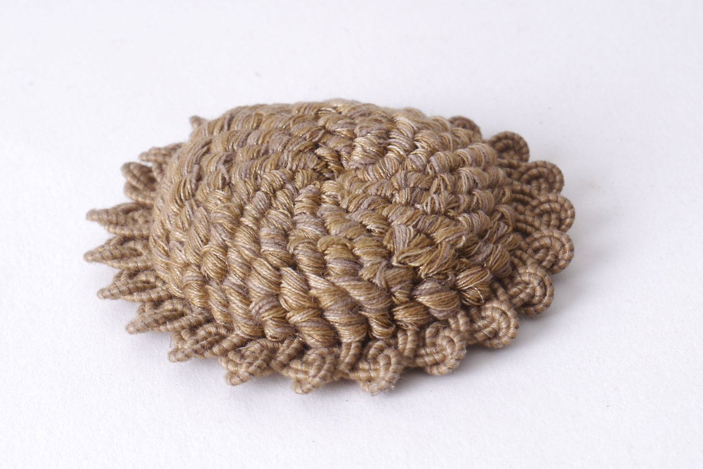 Macaron of rozet als onderdeel voor het vervaardigen van passement