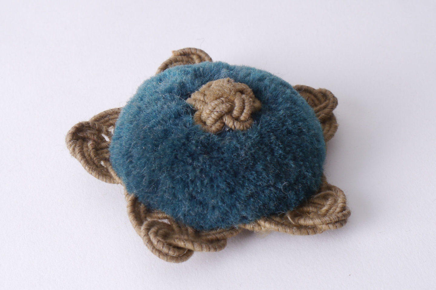 Macaron of rozet als onderdeel voor het vervaardigen van passement