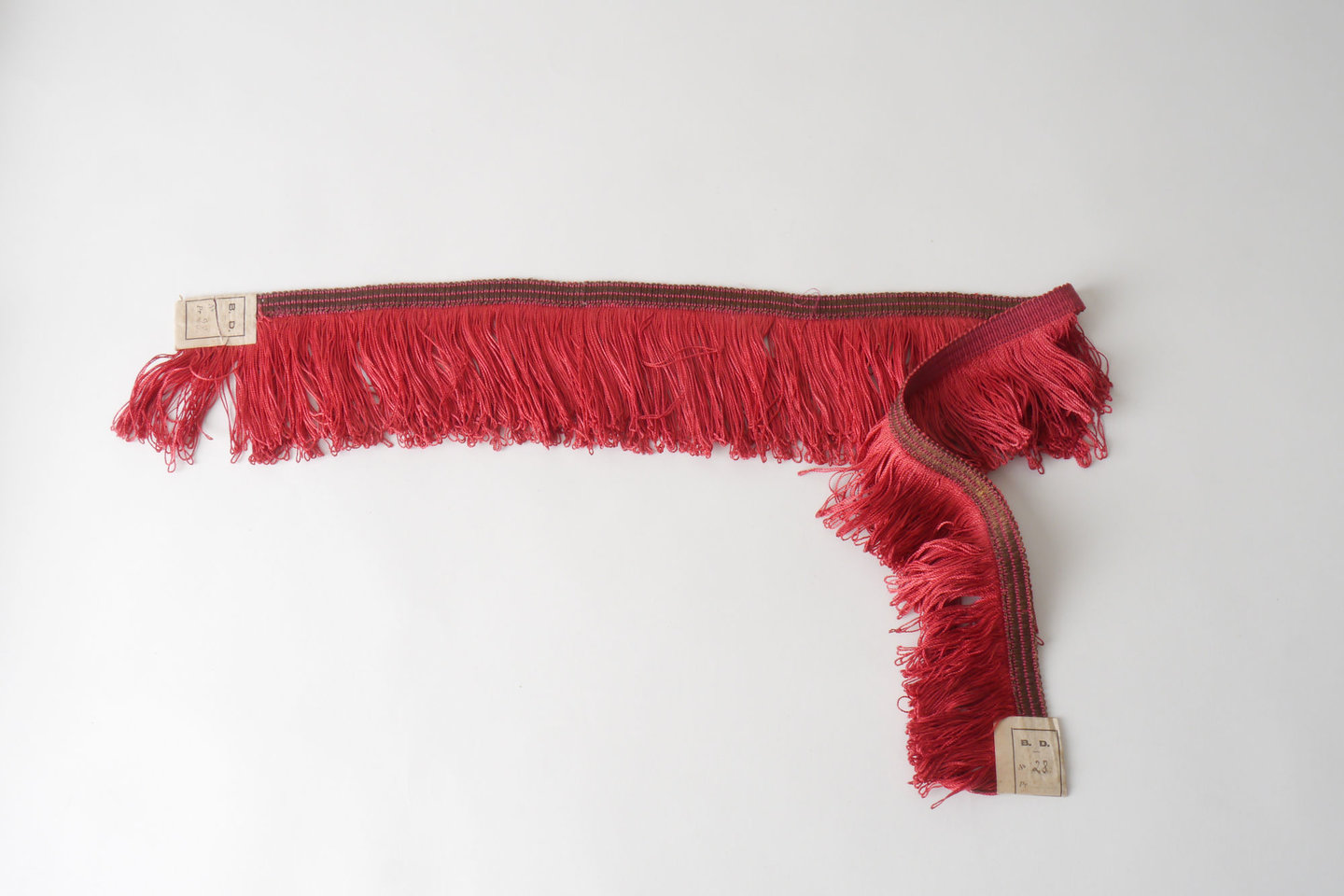 Effilé als onderdeel voor het vervaardigen van passement