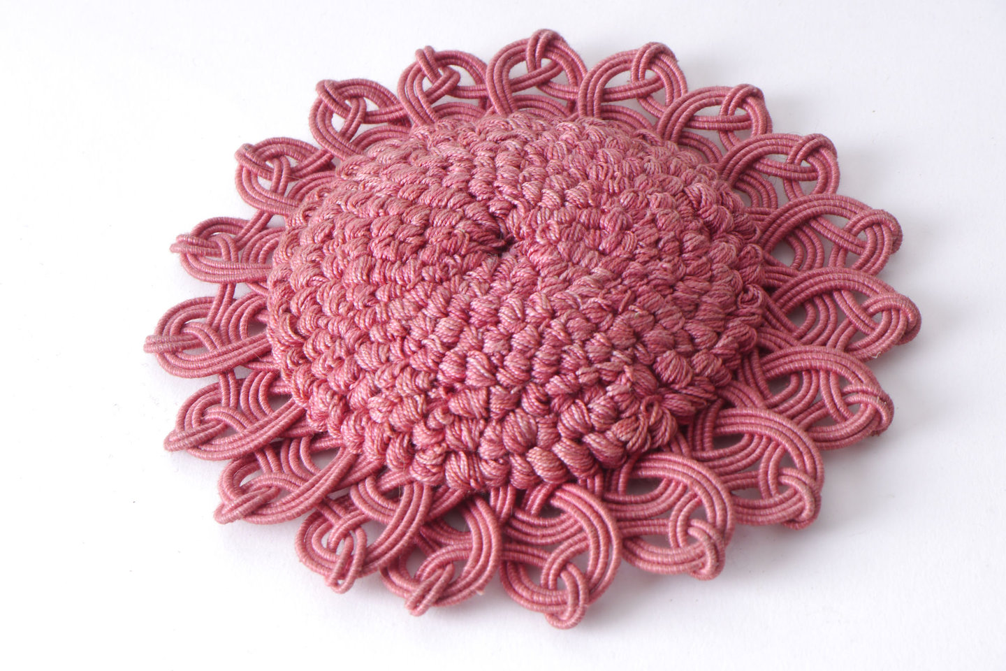 Macaron of rozet als onderdeel voor het vervaardigen van passement