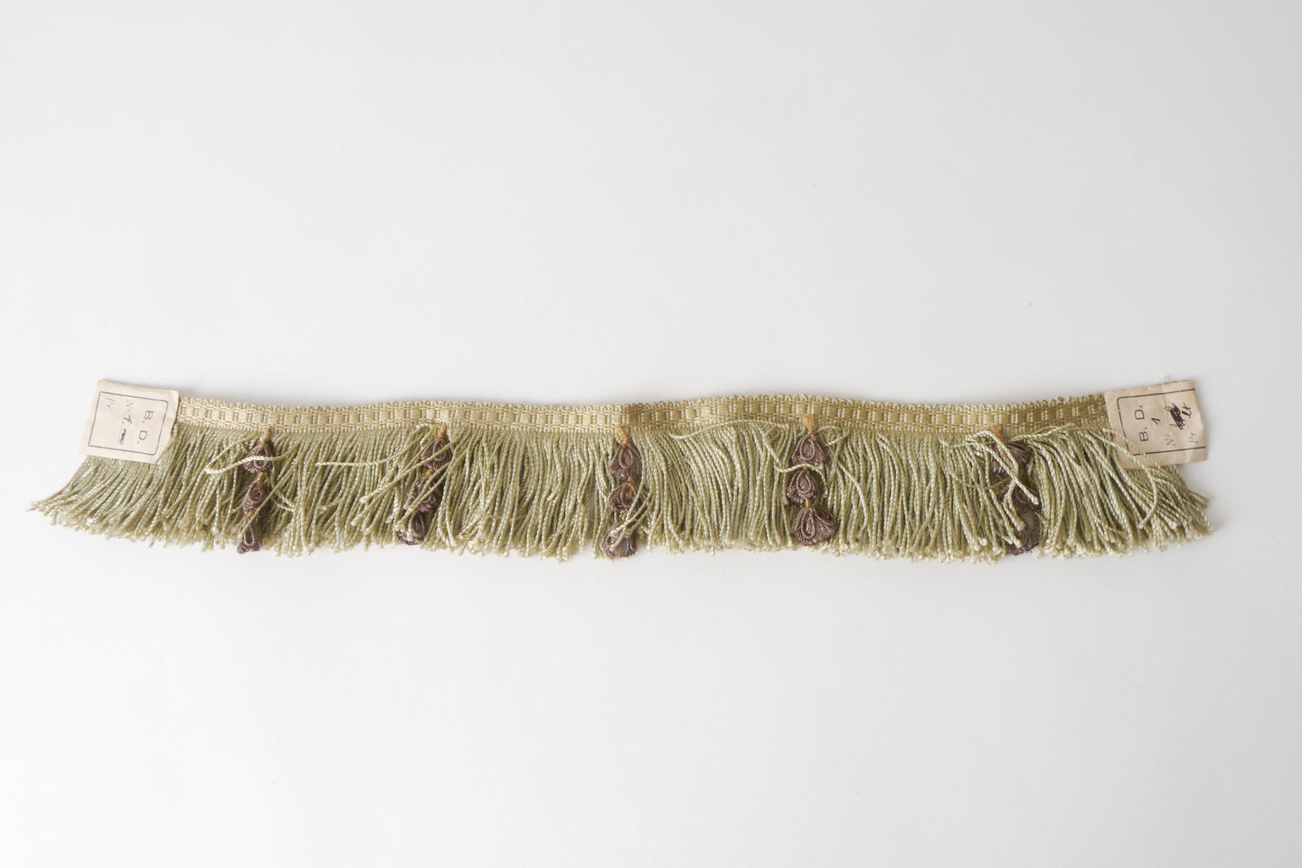 Effilé als onderdeel voor het vervaardigen van passement