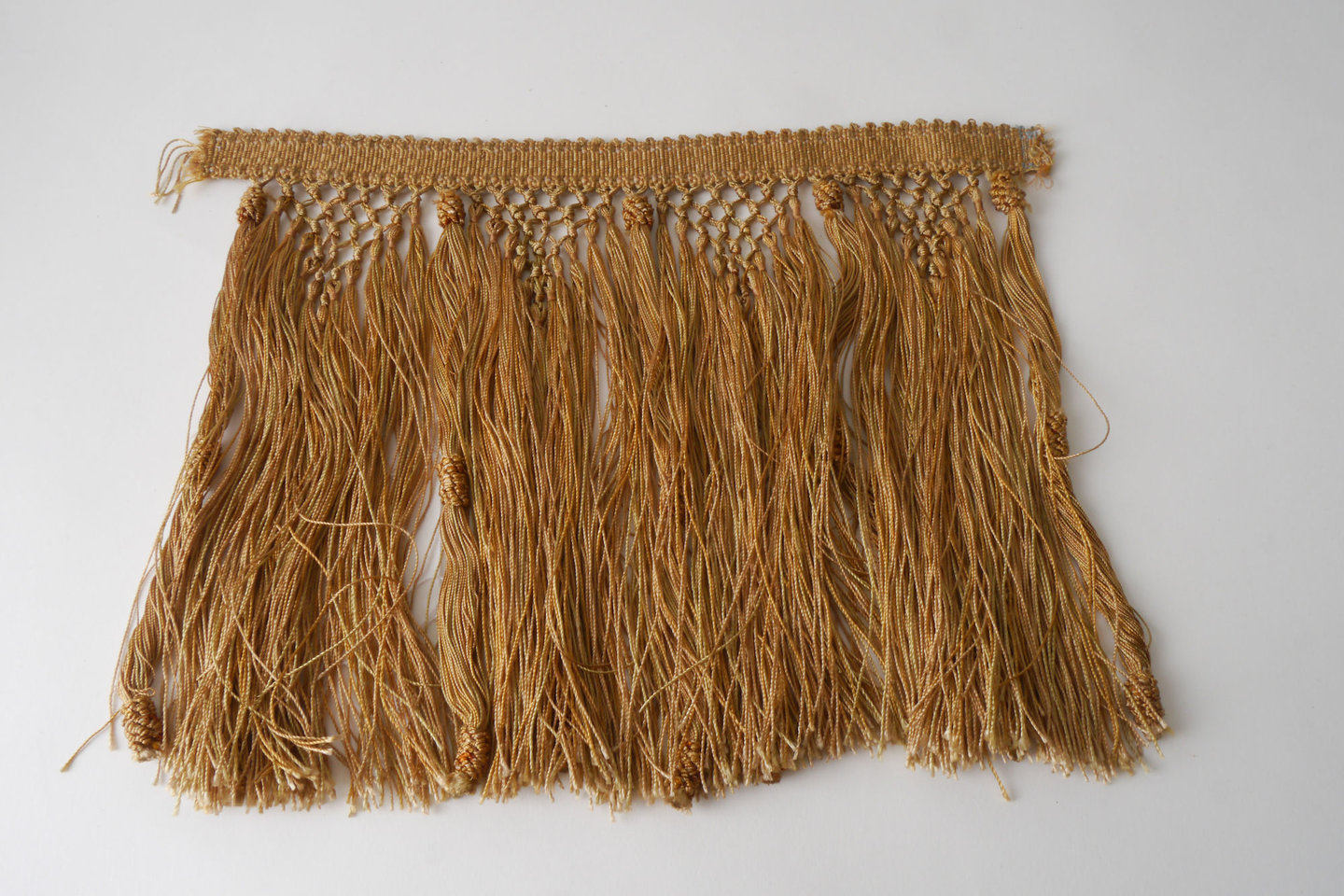 Frange als onderdeel voor het vervaardigen van passement