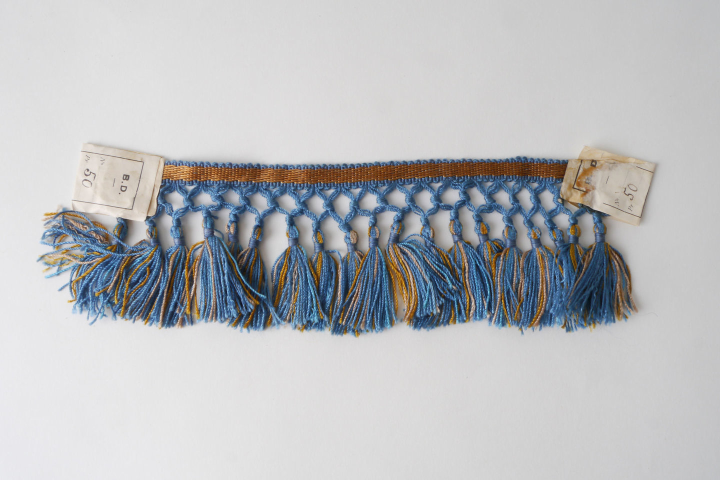 Frange als onderdeel voor het vervaardigen van passement