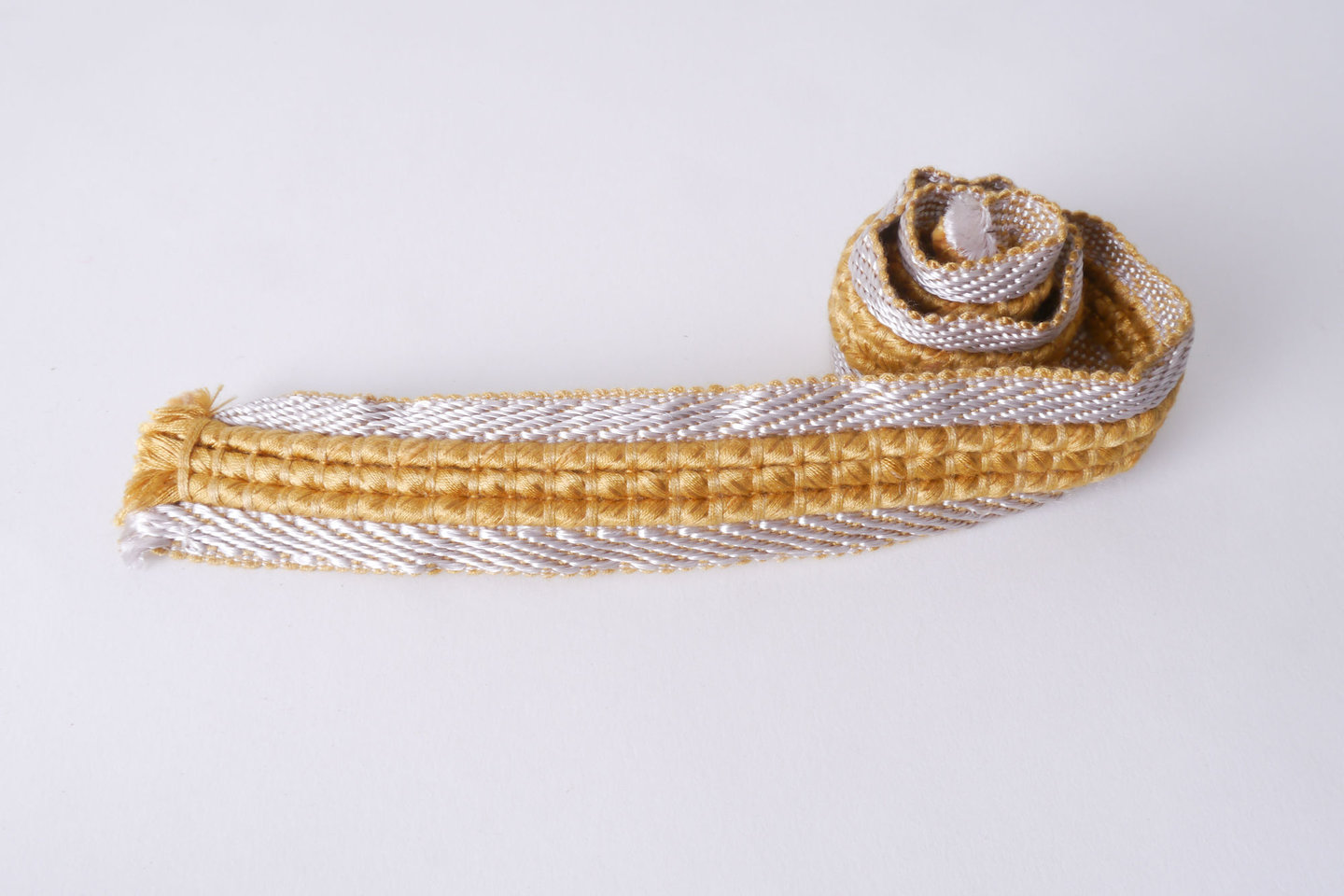 Galon of boord als onderdeel voor het vervaardigen van passement