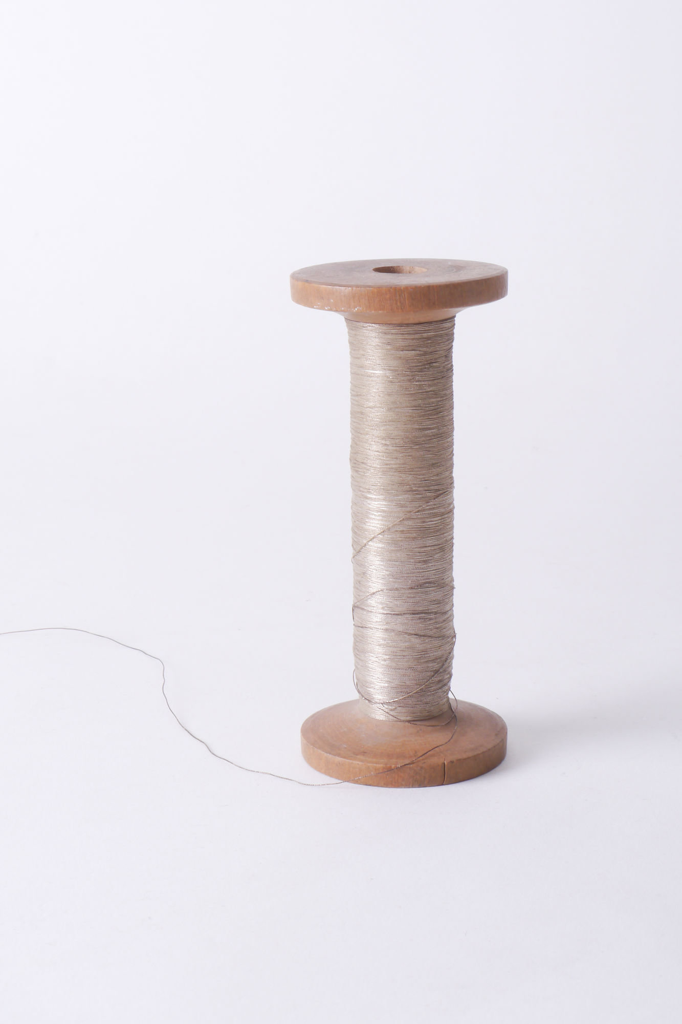 Spoel met metaaldraad voor passement