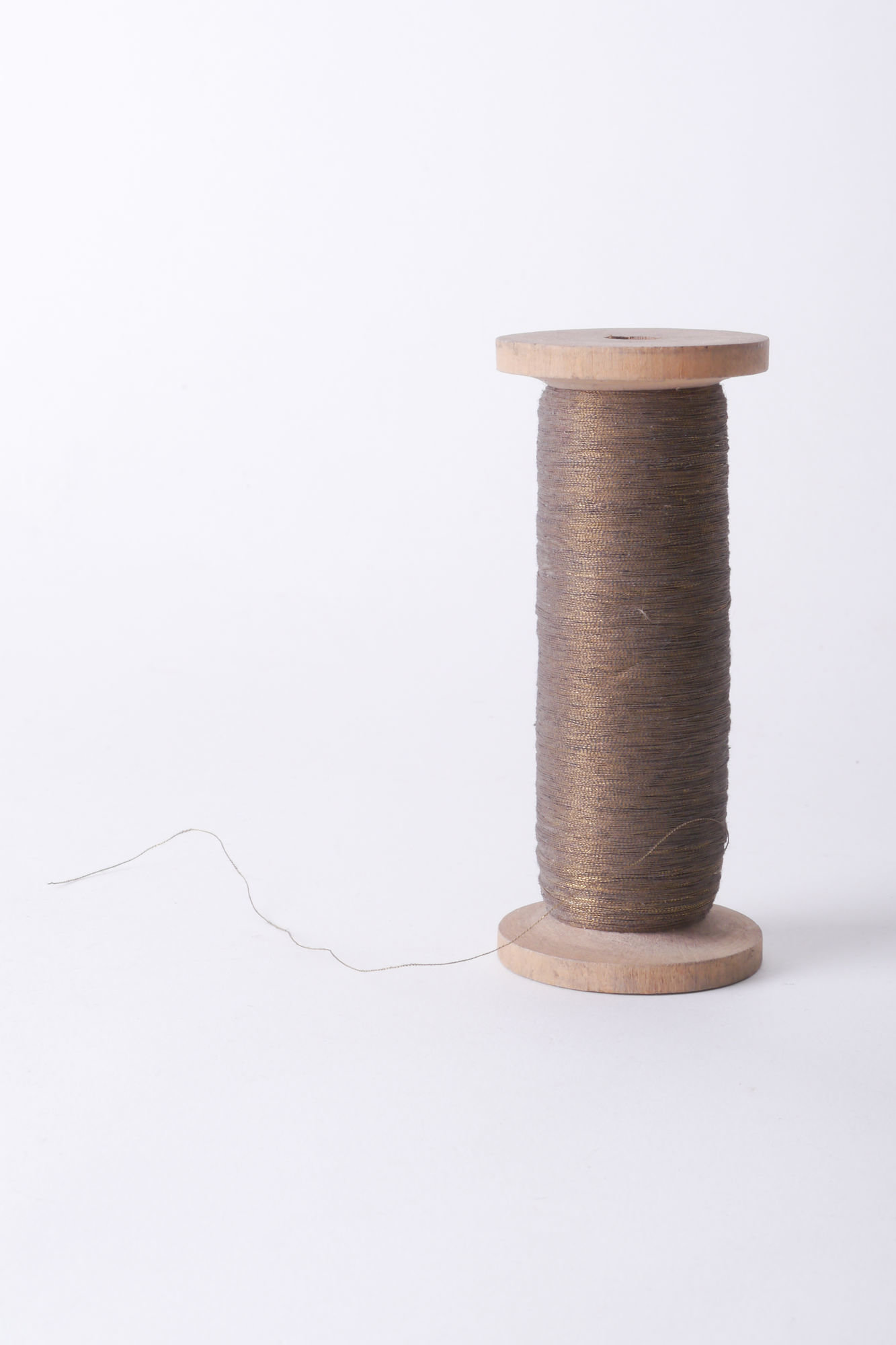 Spoel met metaaldraad voor passement