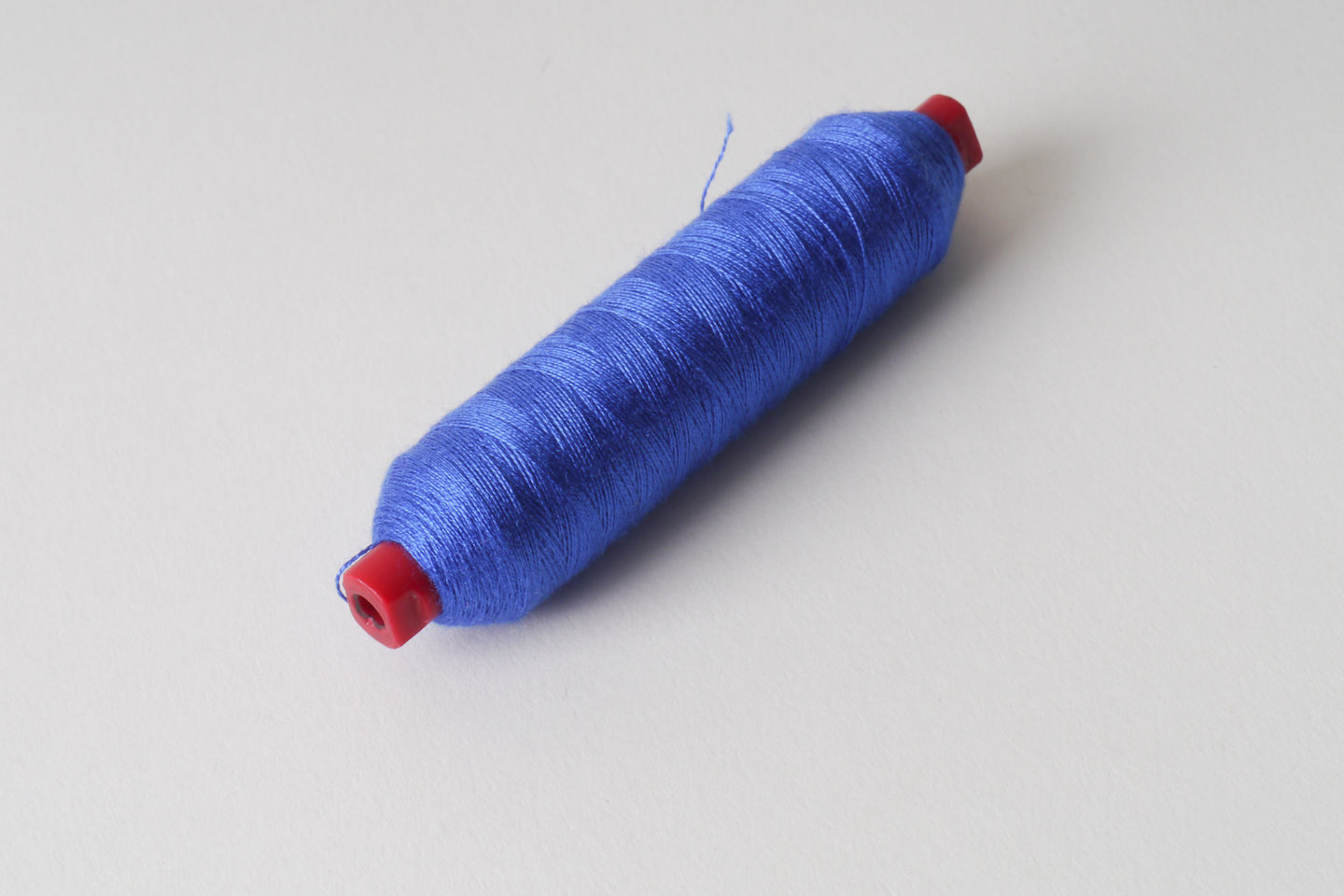 Spoel met inslaggaren voor passement