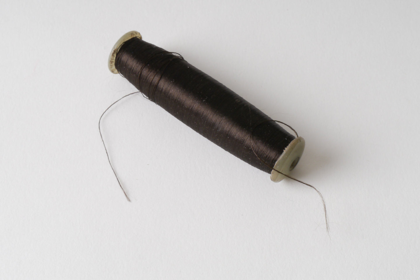 Spoel met inslaggaren voor passement