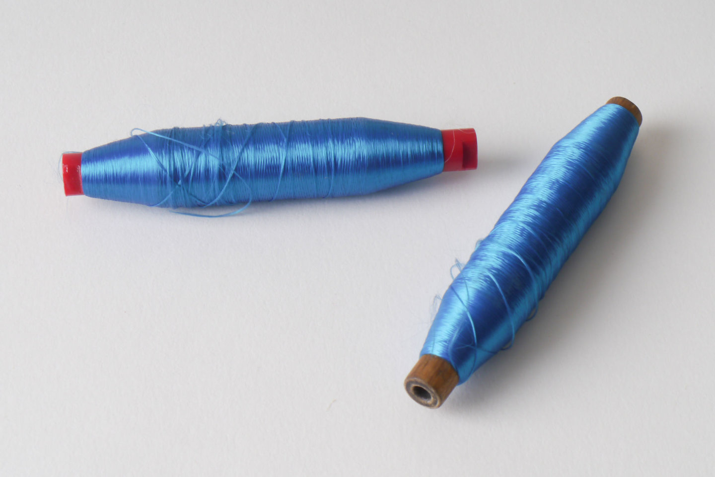 Spoel met inslaggaren voor passement