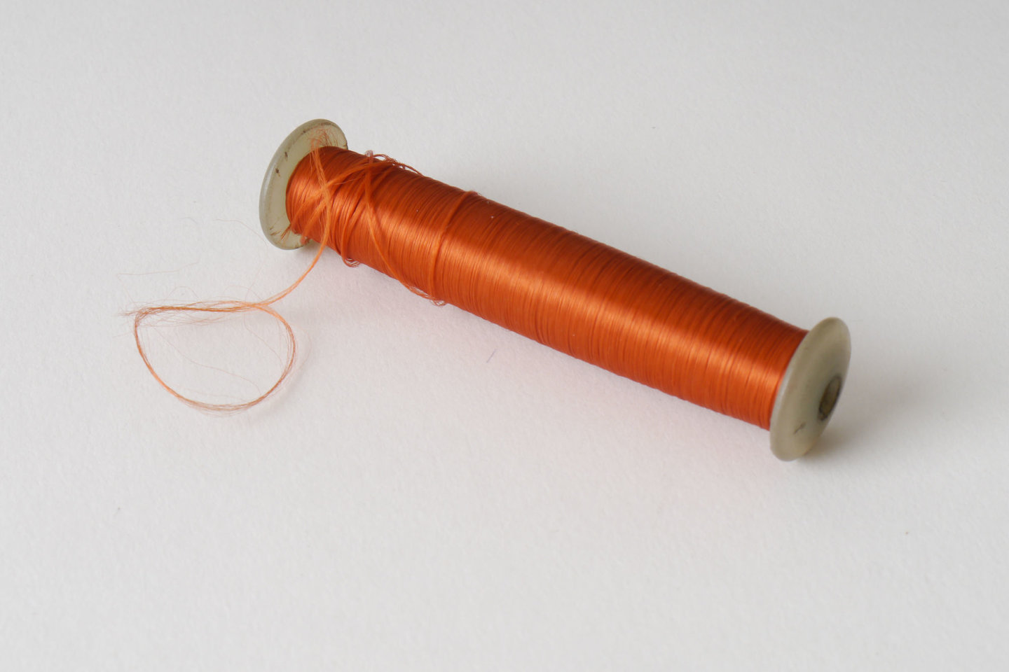 Spoel met inslaggaren voor passement