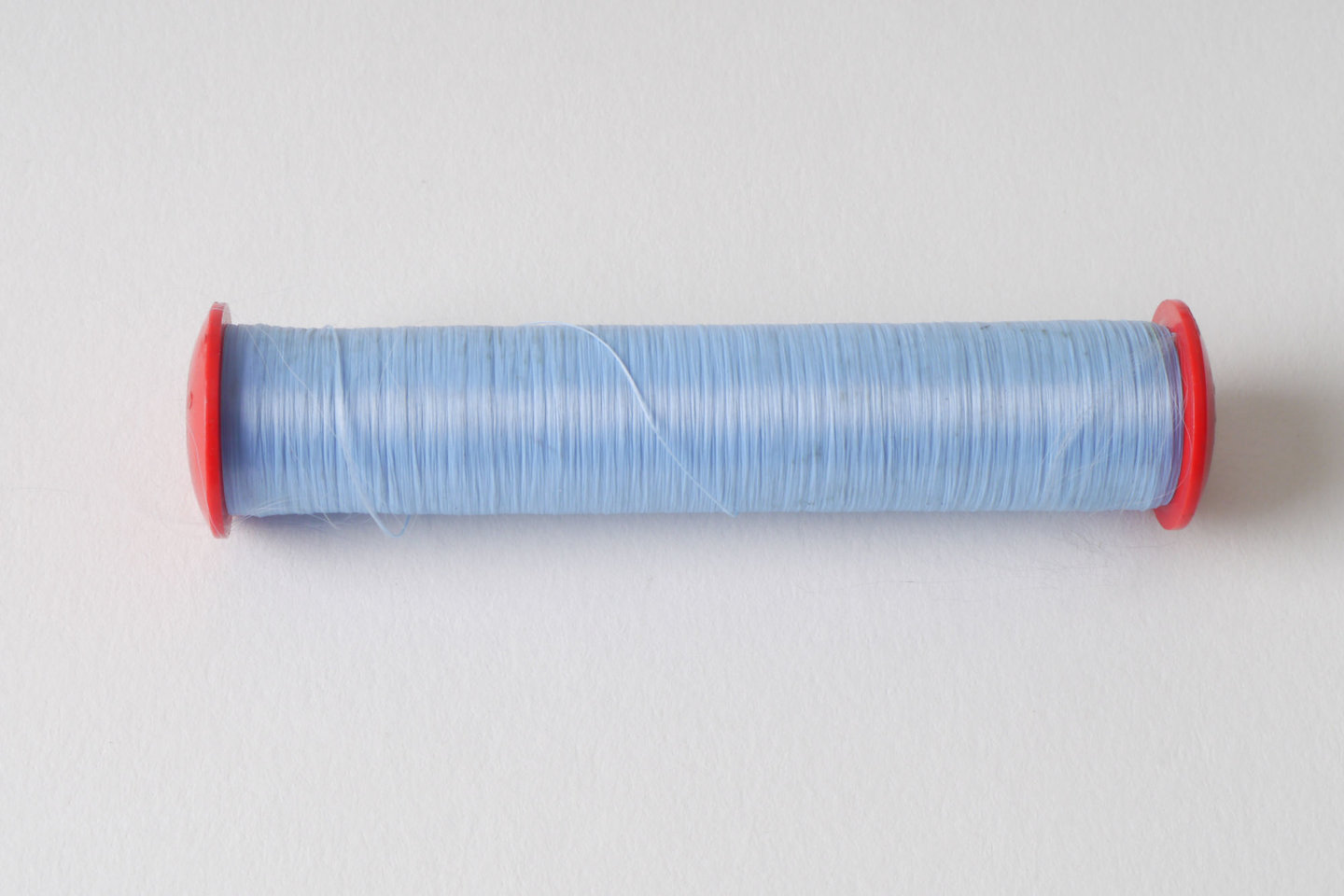 Spoel met inslaggaren voor passement