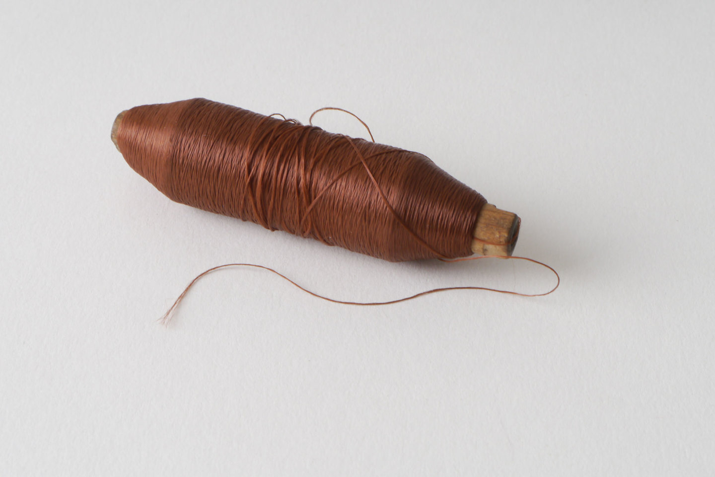 Spoel met inslaggaren voor passement