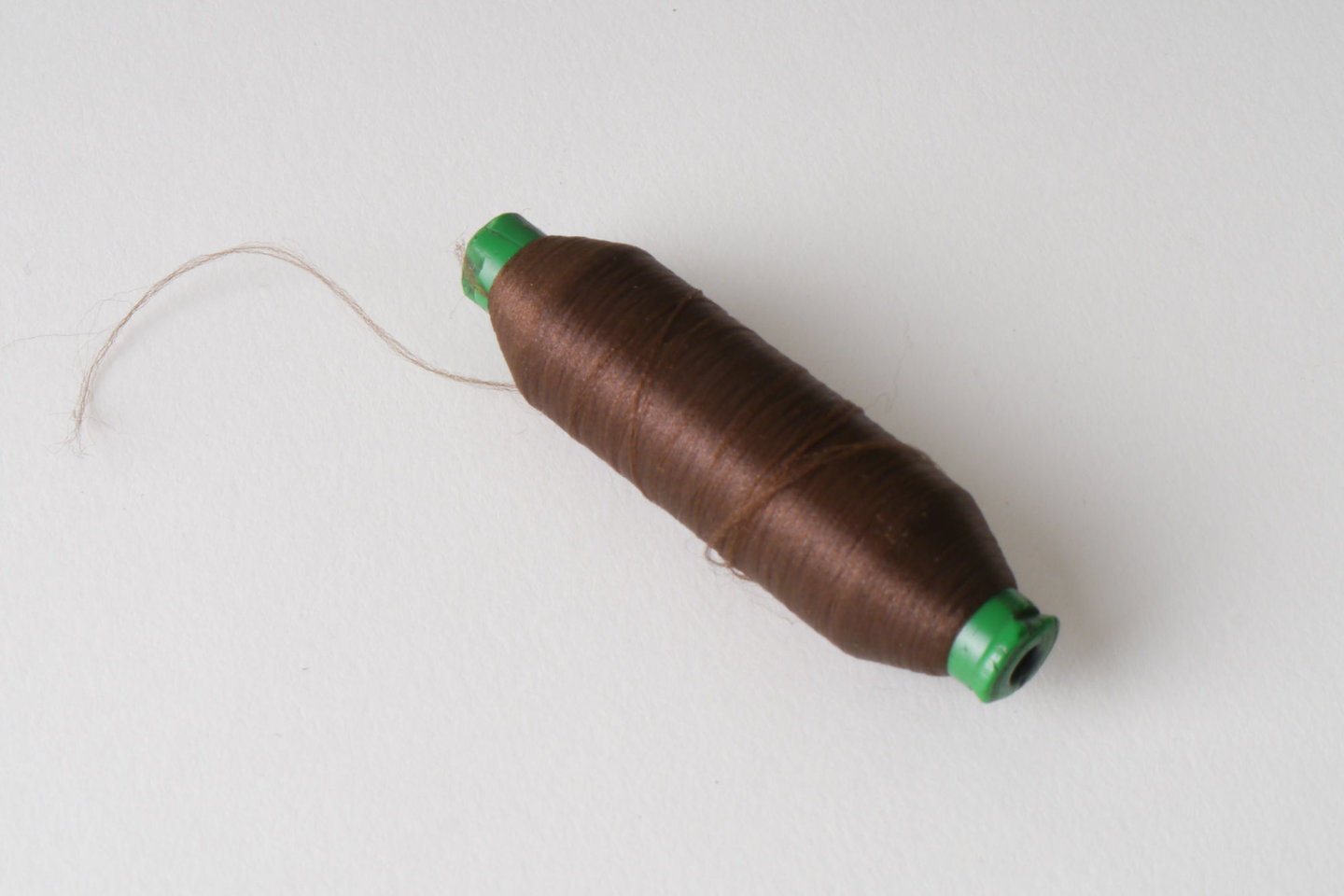 Spoel met inslaggaren voor passement