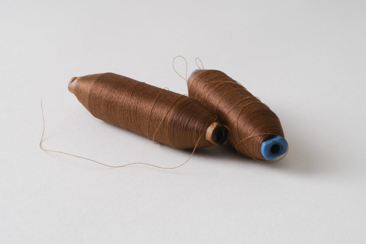 Spoel met inslaggaren voor passement