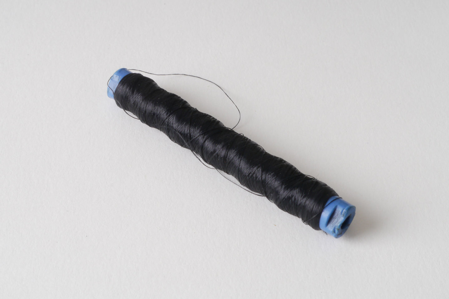 Spoel met inslaggaren voor passement