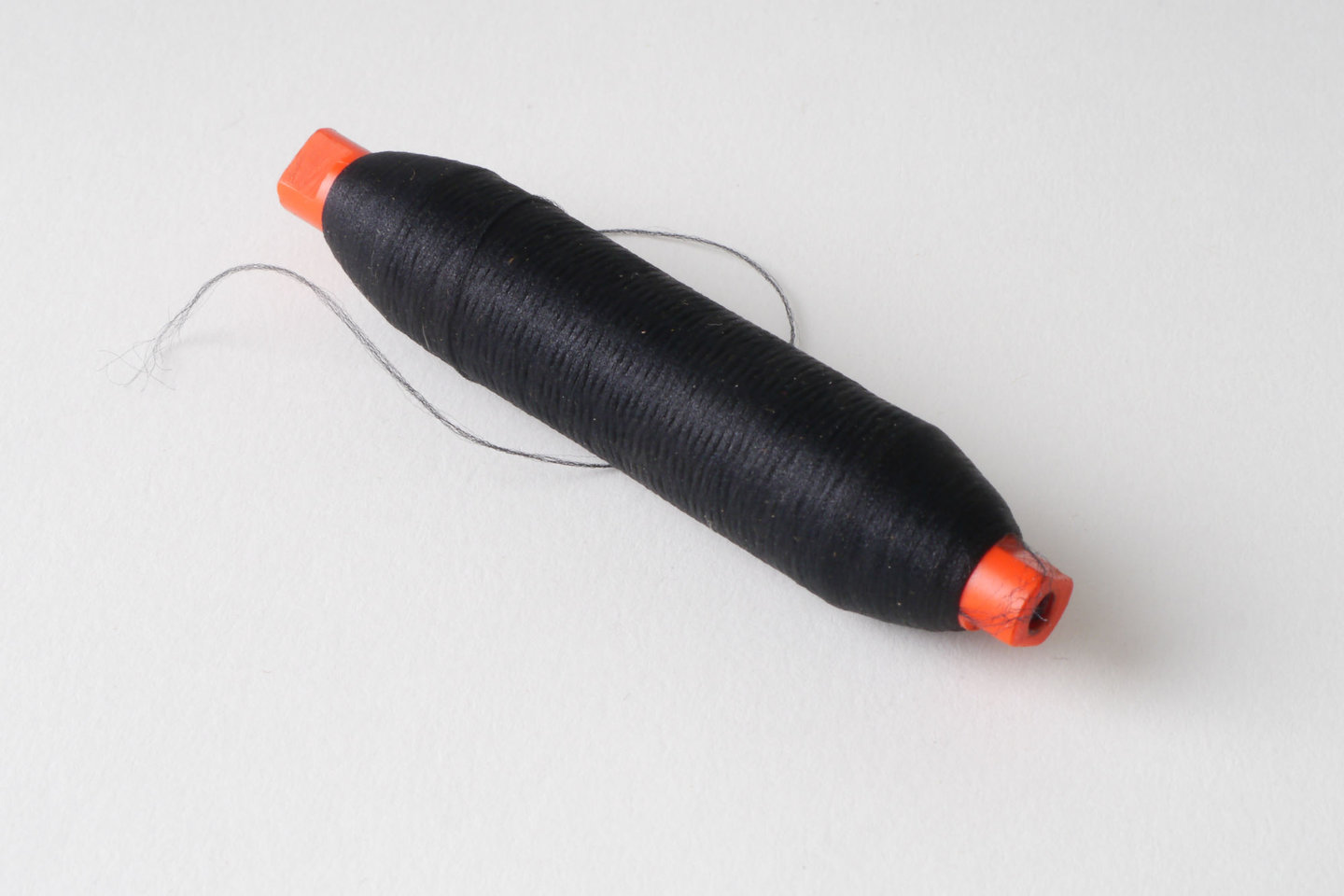 Spoel met inslaggaren voor passement