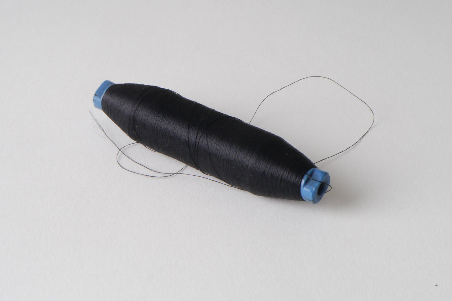 Spoel met inslaggaren voor passement