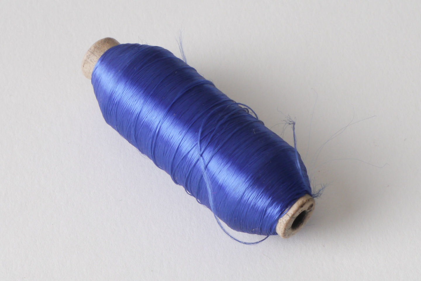 Spoel met inslaggaren voor passement