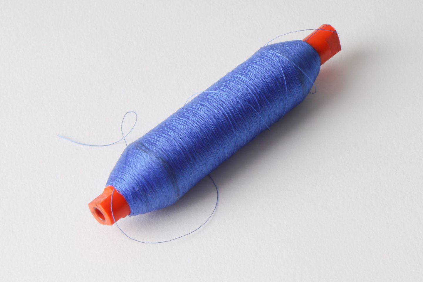 Spoel met inslaggaren voor passement