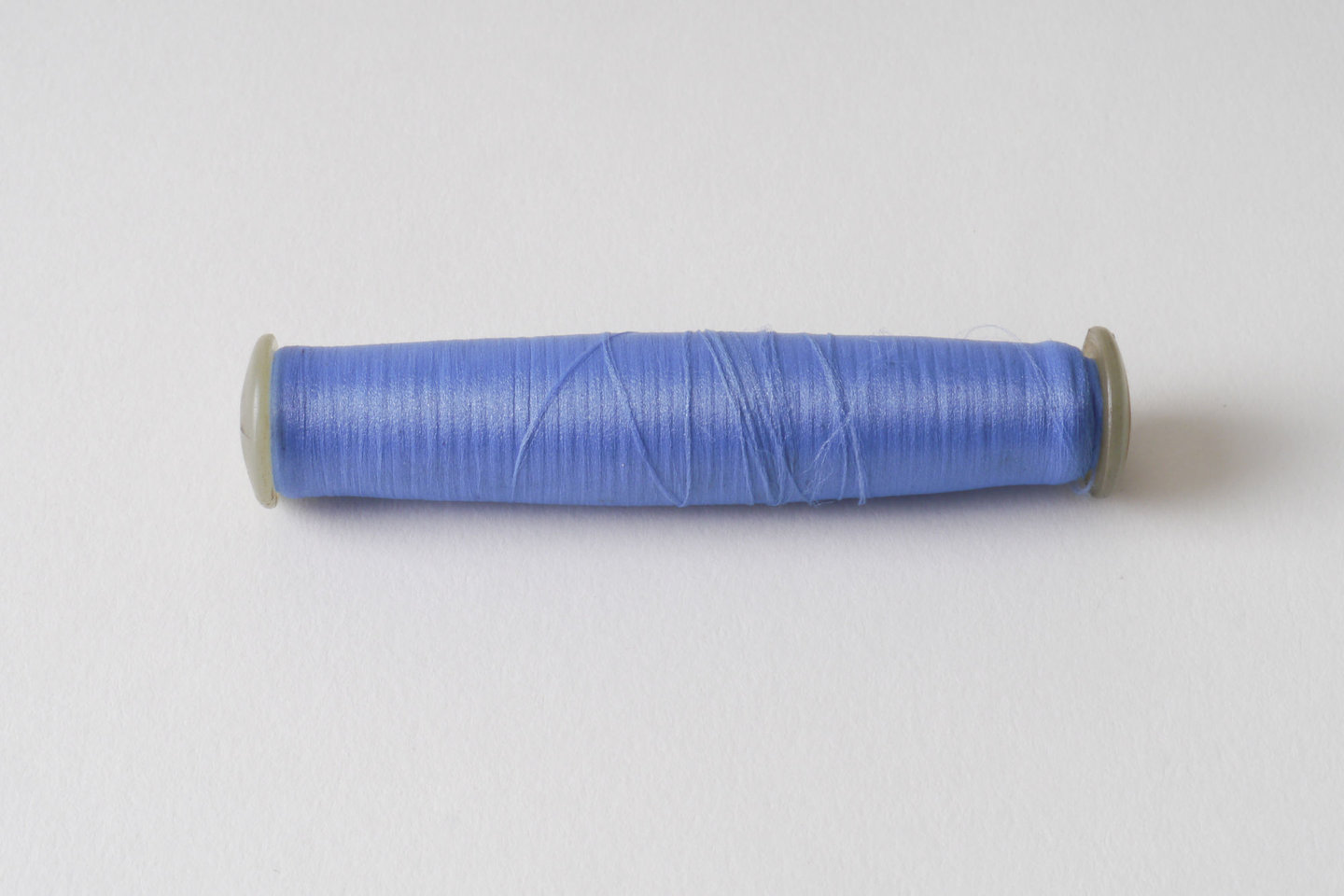 Spoel met inslaggaren voor passement