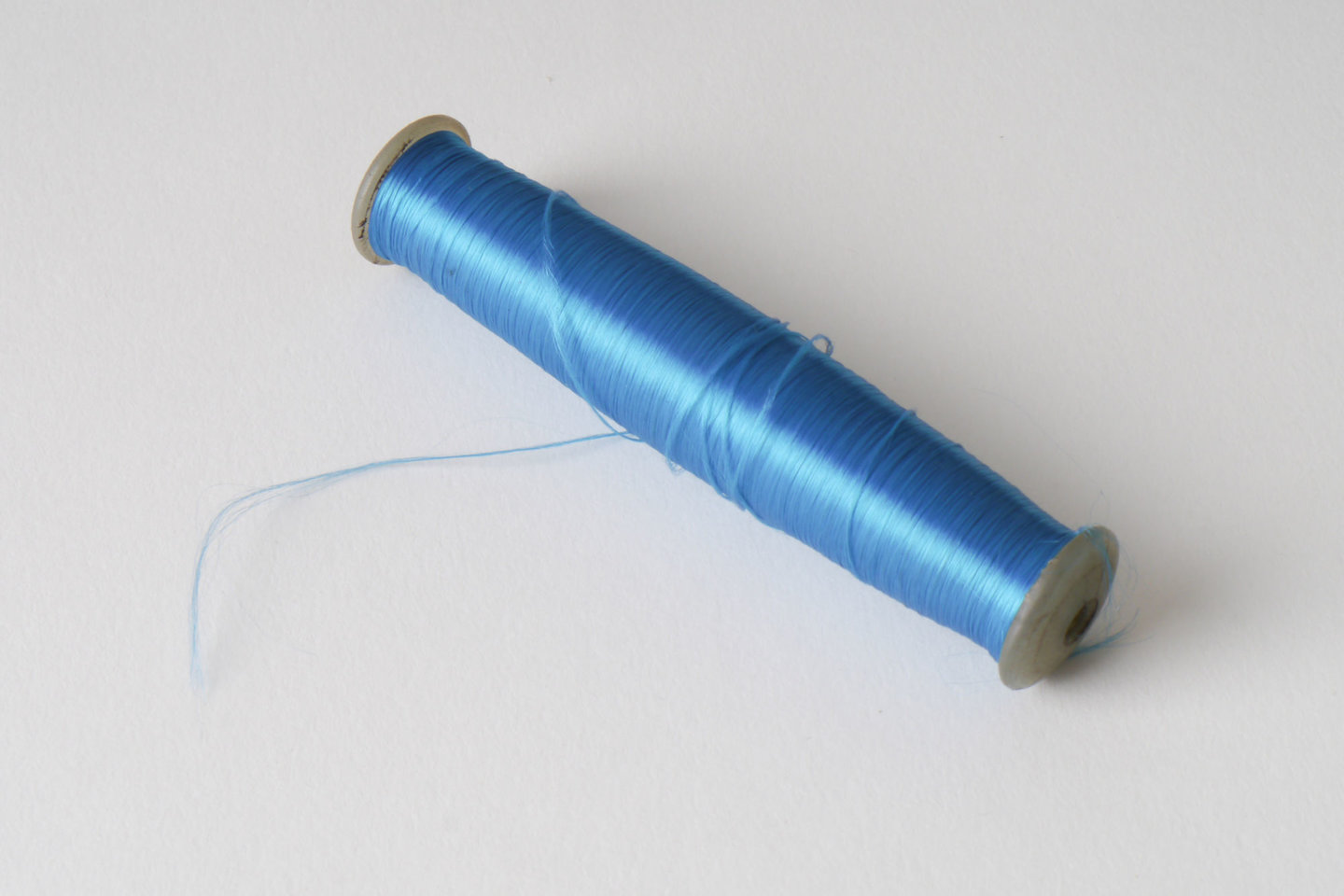 Spoel met inslaggaren voor passement