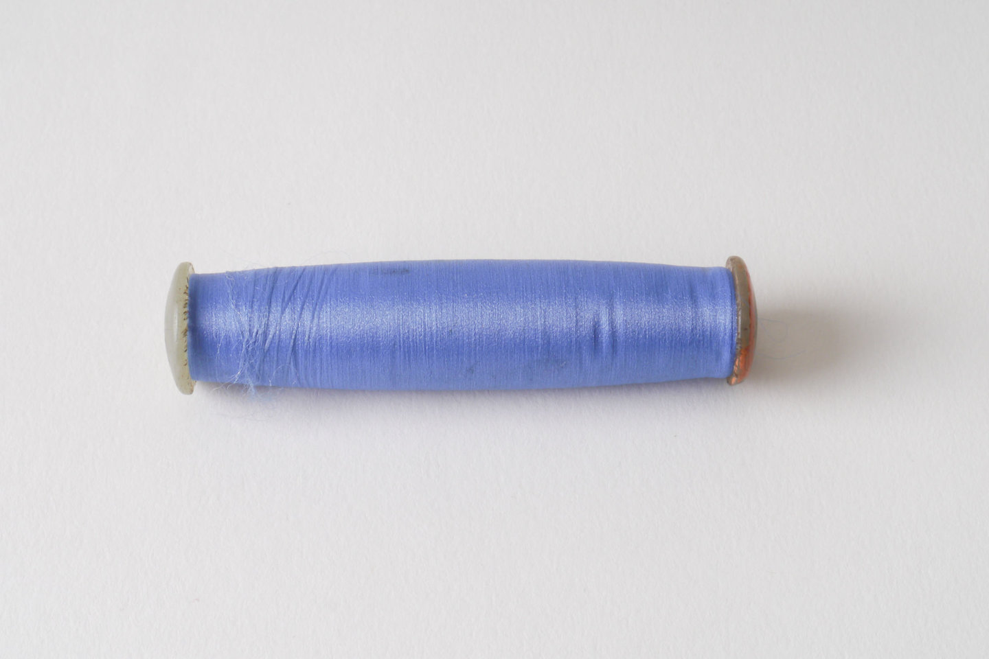 Spoel met inslaggaren voor passement