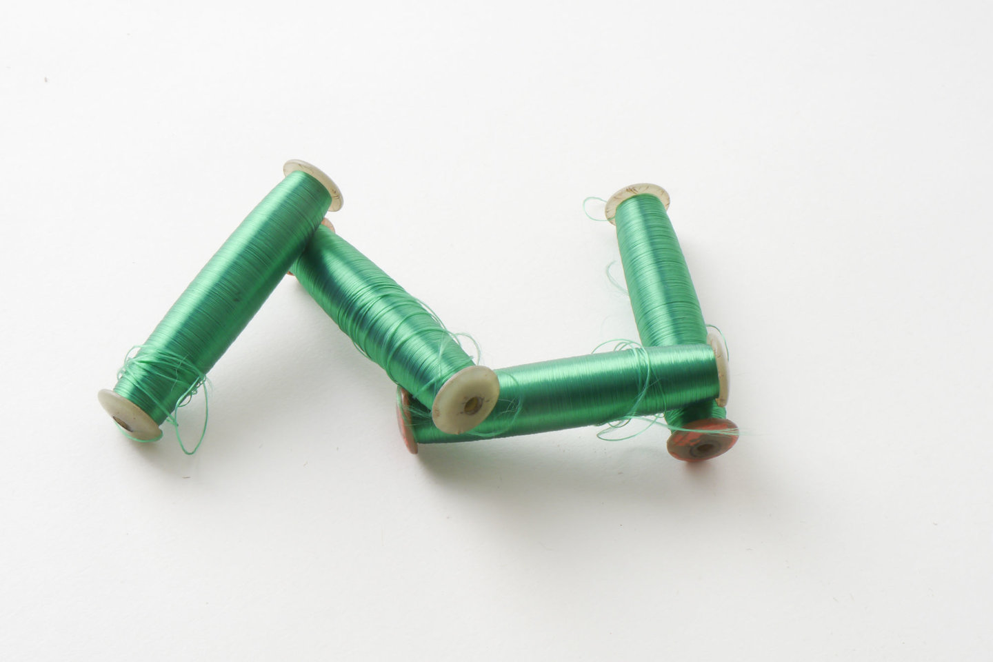 Spoel met inslaggaren voor passement