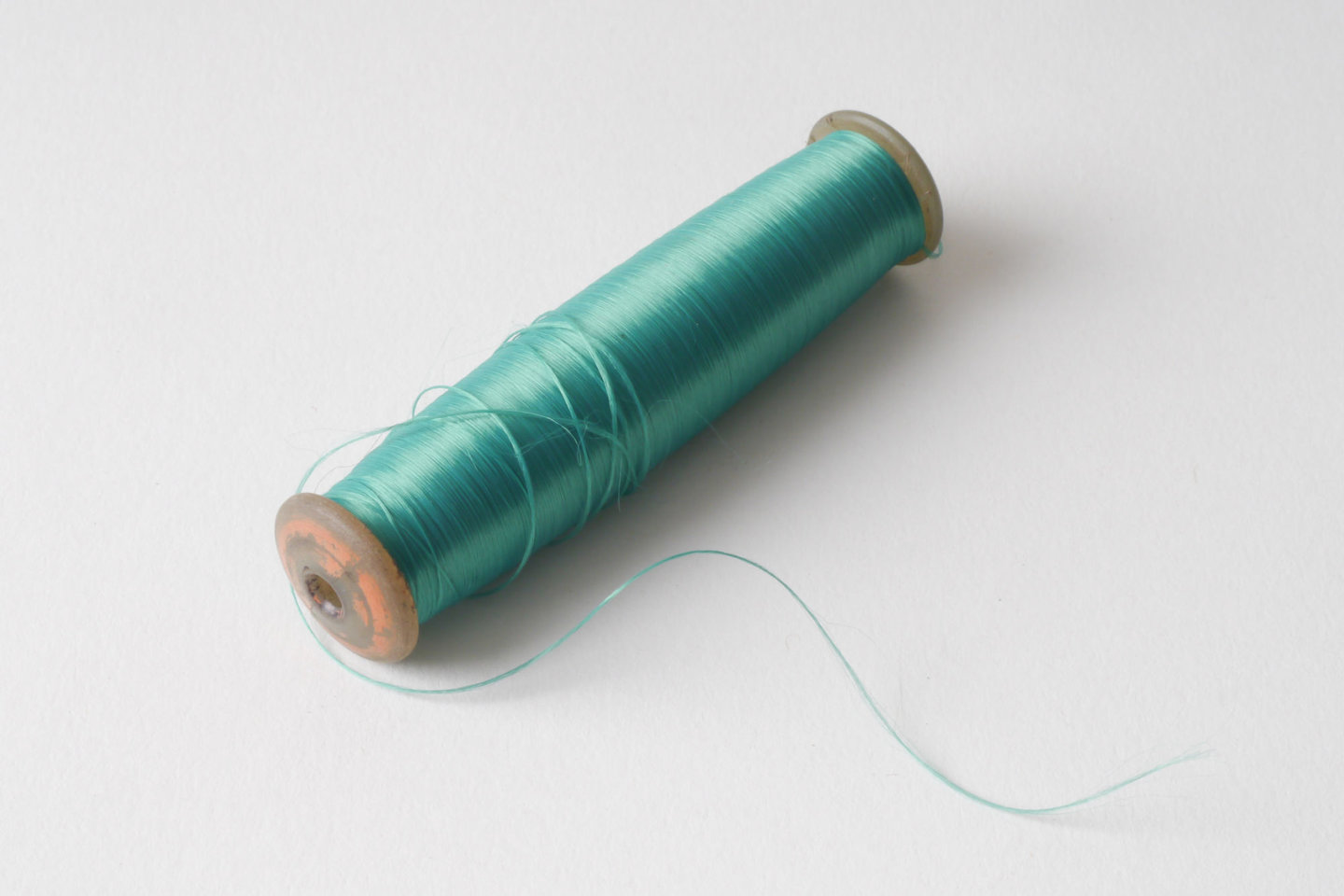 Spoel met inslaggaren voor passement