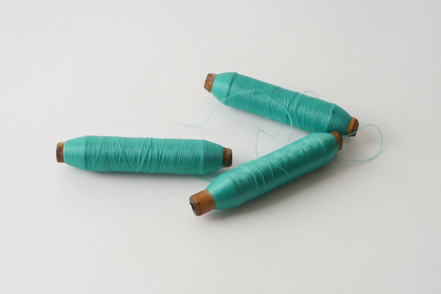 Spoel met inslaggaren voor passement