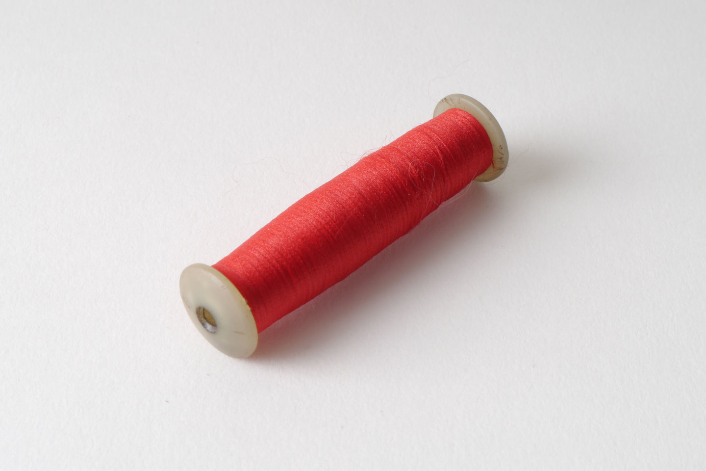 Spoel met inslaggaren voor passement