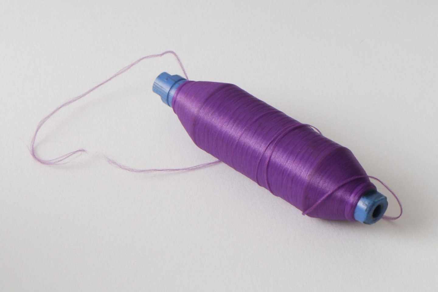 Spoel met inslaggaren voor passement