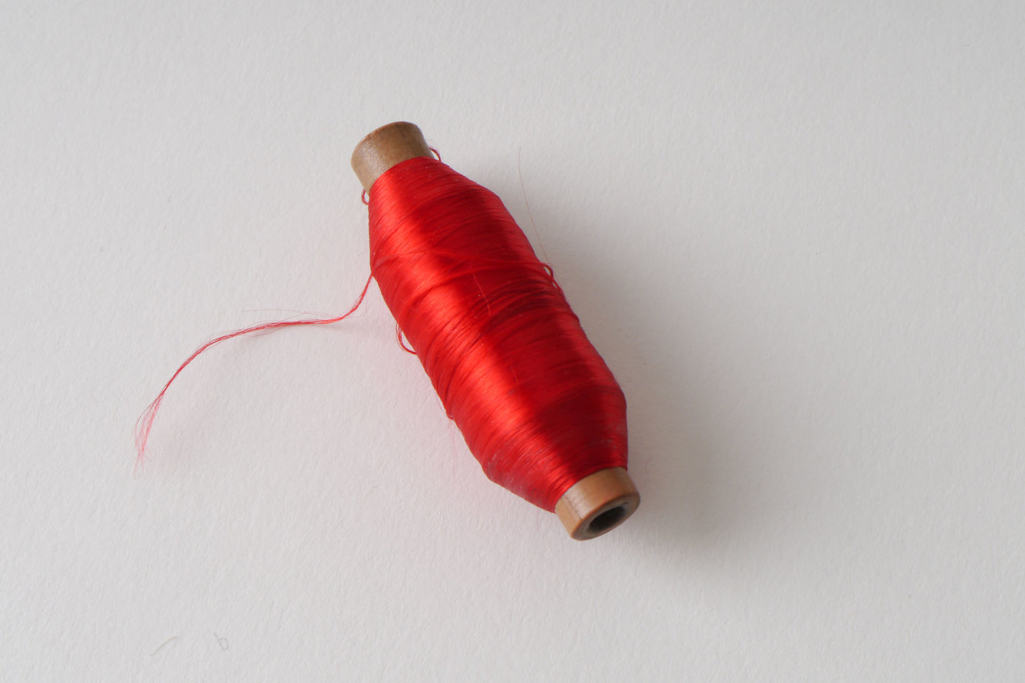 Spoel met inslaggaren voor passement