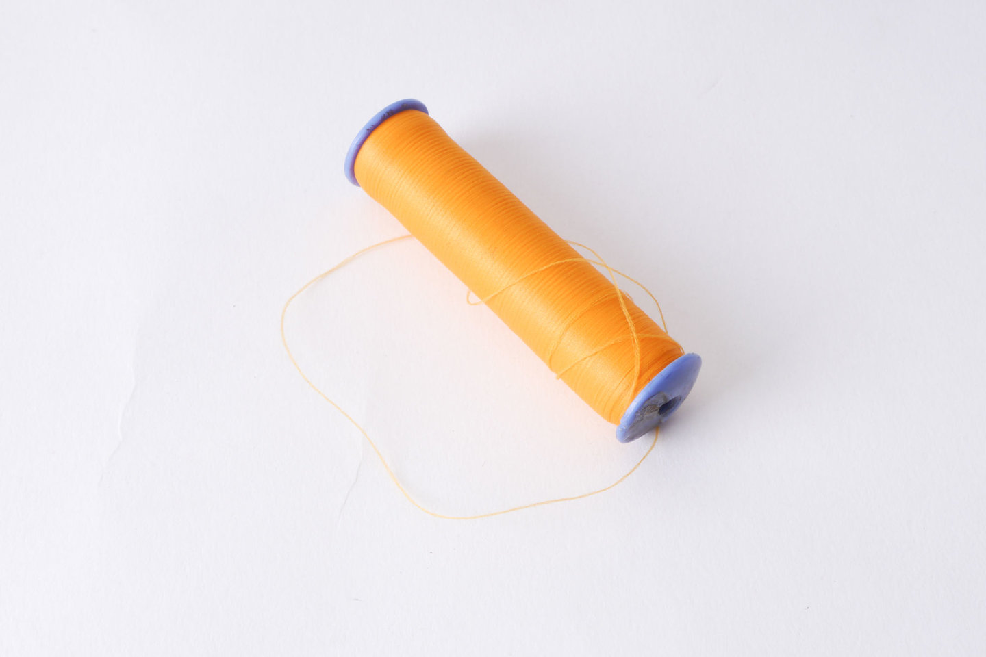 Spoel met inslaggaren voor passement