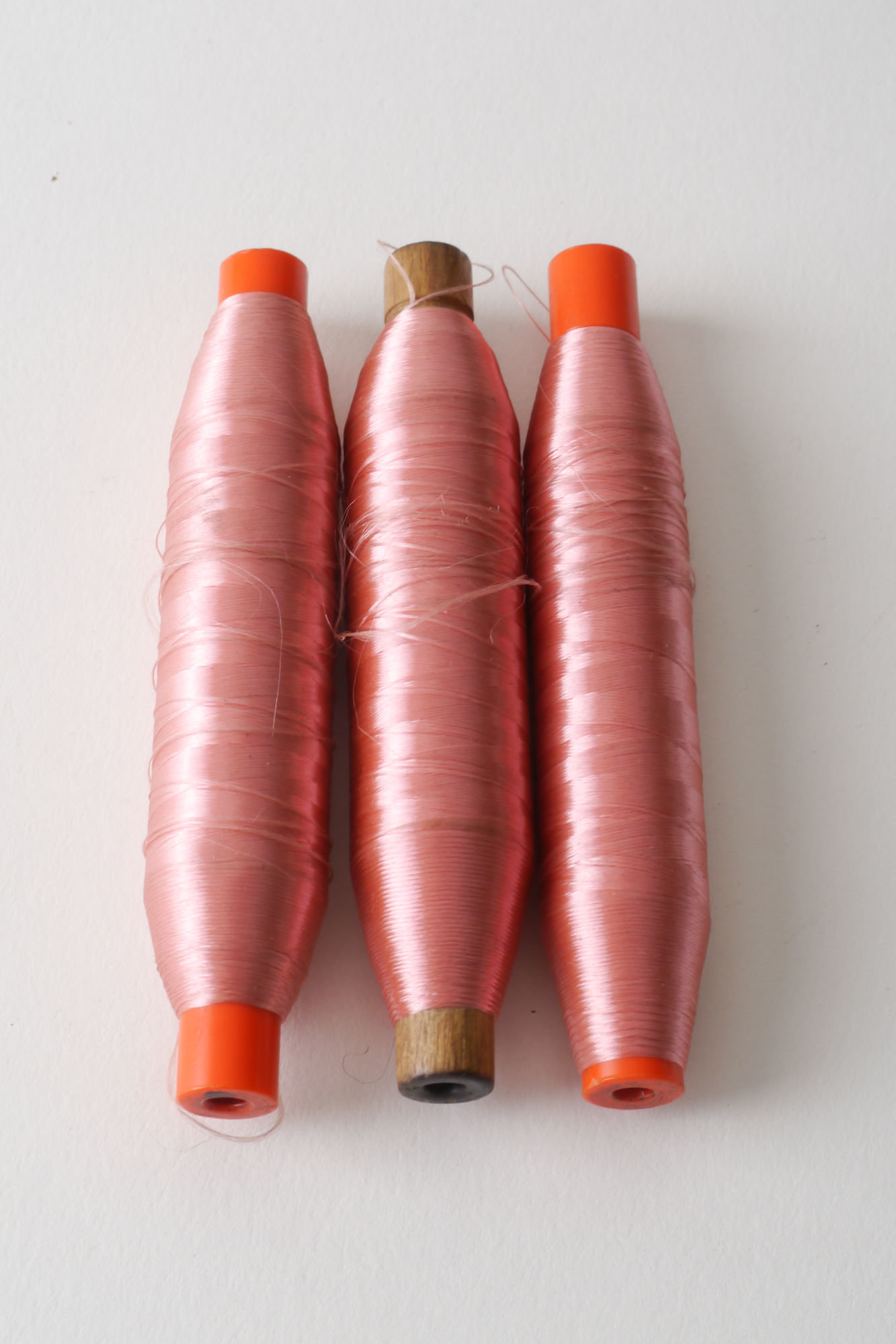 Spoel met inslaggaren voor passement