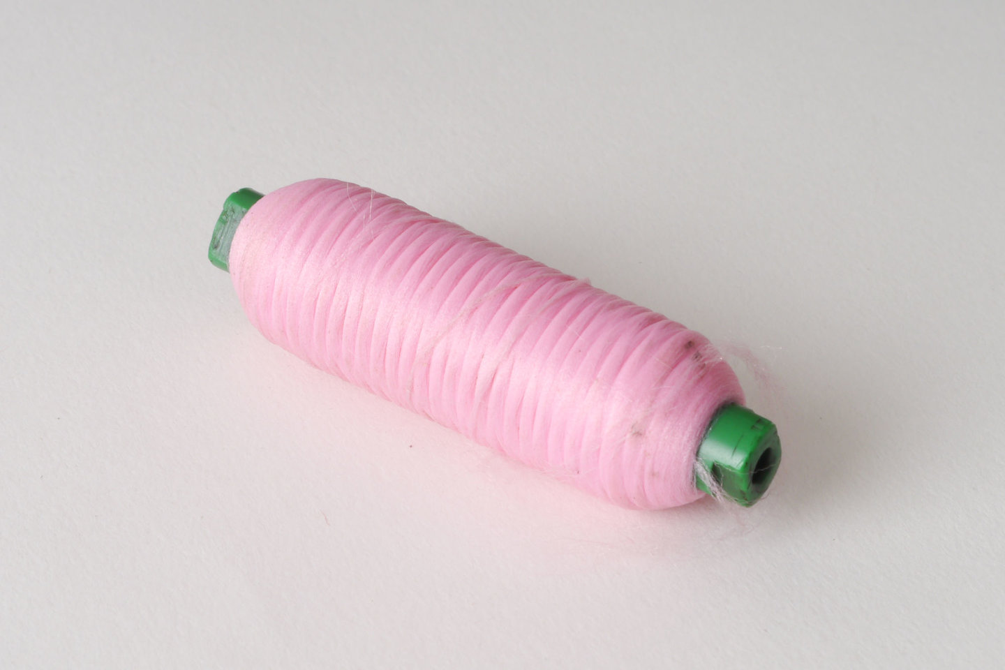 Spoel met inslaggaren voor passement