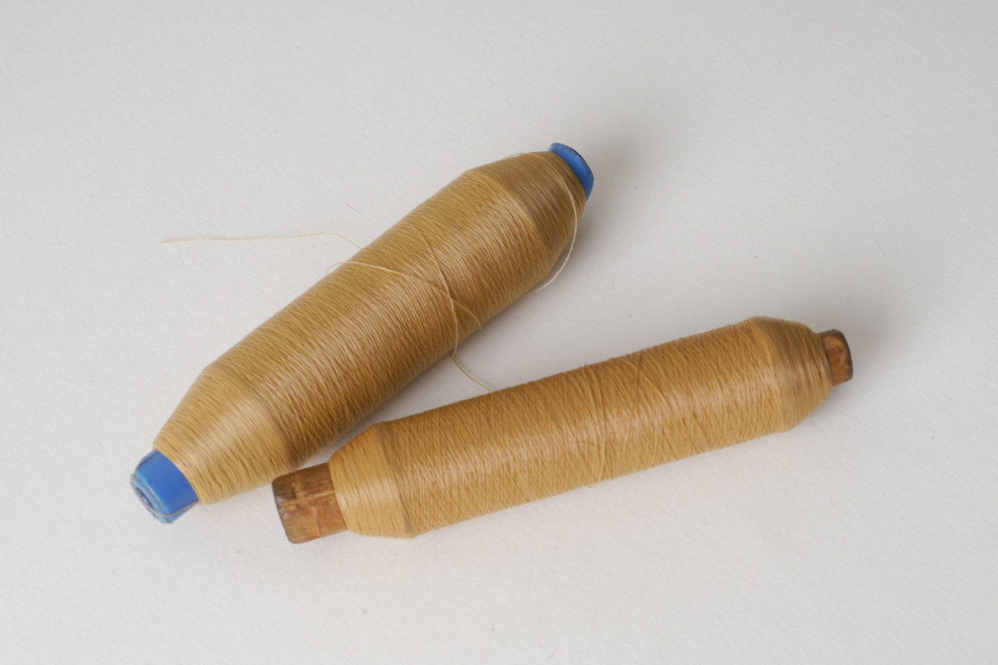 Spoel met inslaggaren voor passement