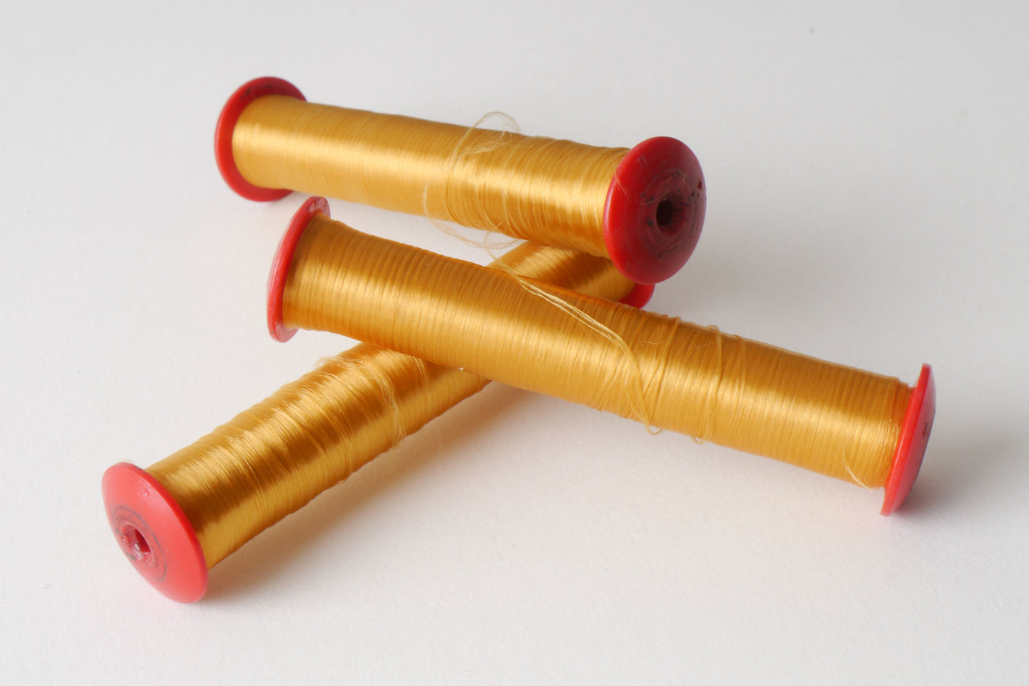 Spoel met inslaggaren voor passement