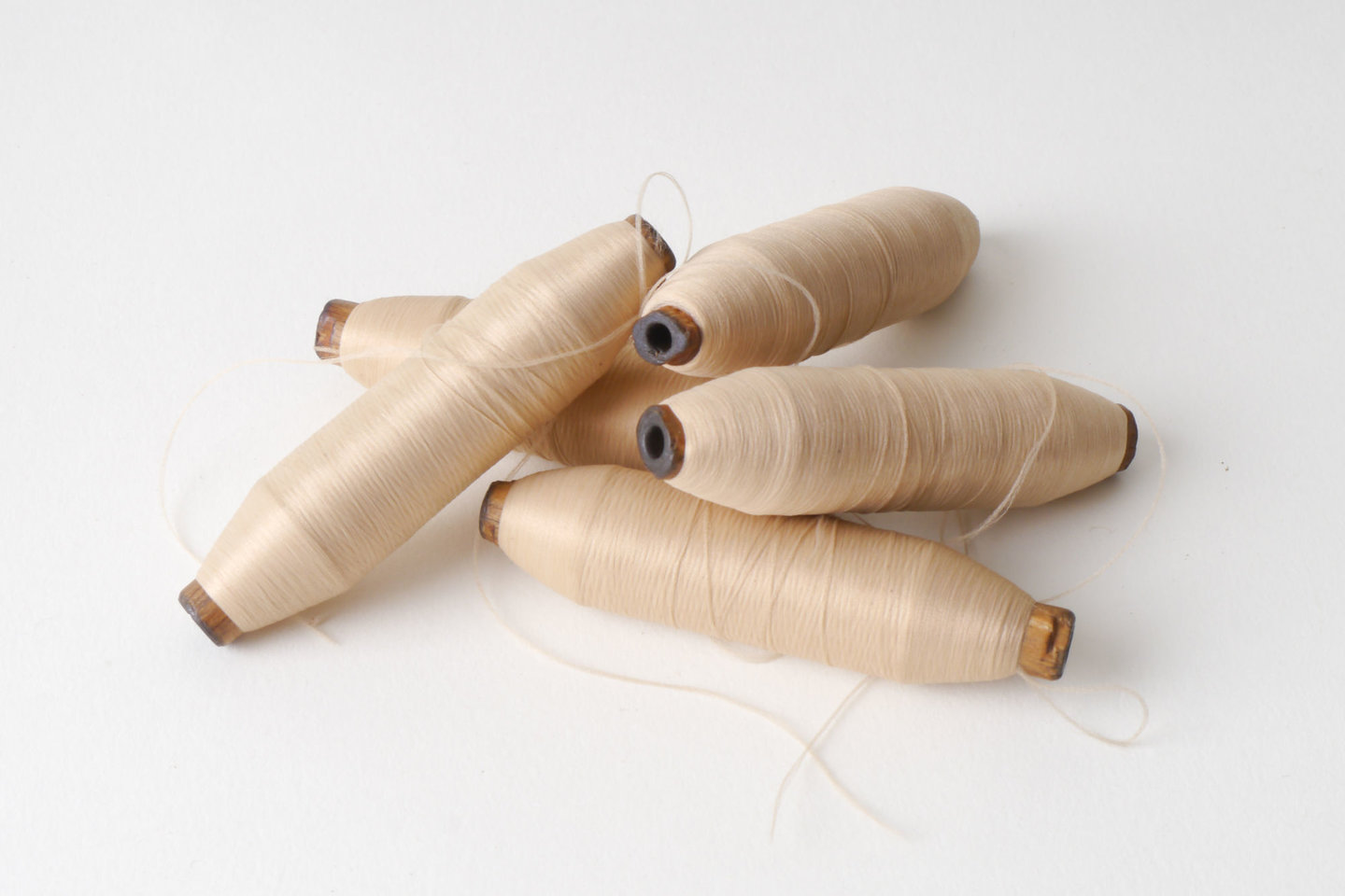 Spoel met inslaggaren voor passement