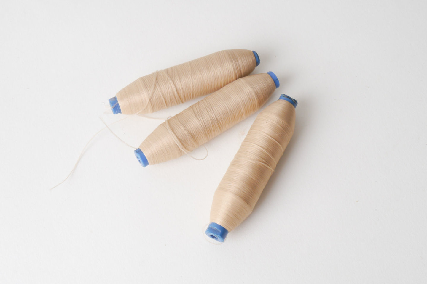 Spoel met inslaggaren voor passement